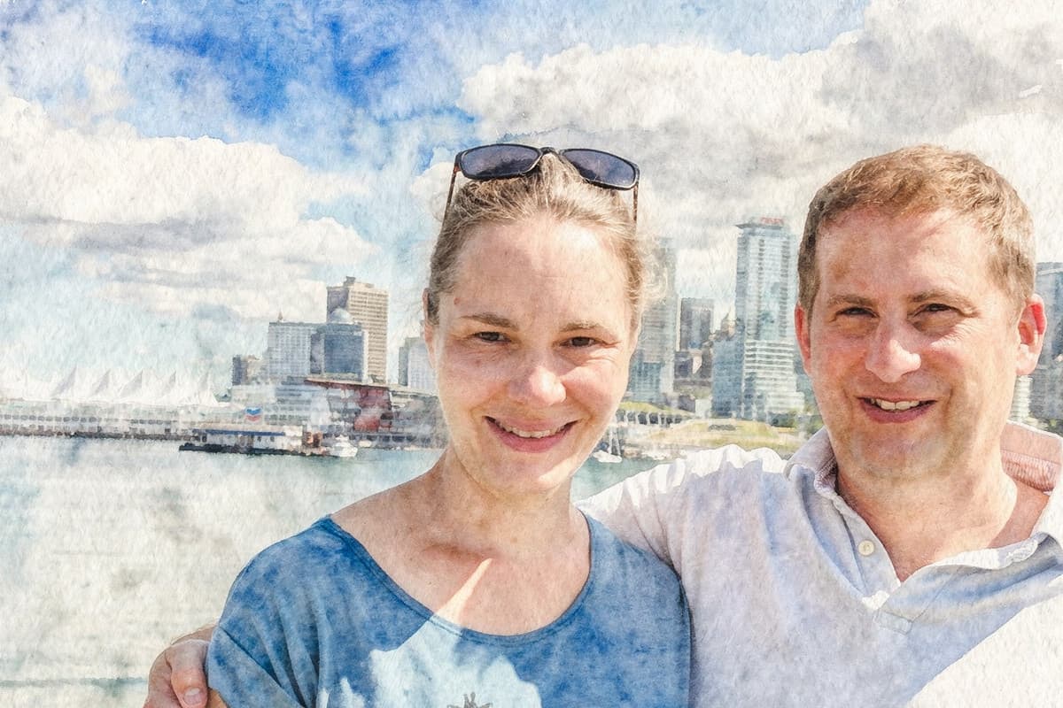 Christine and Steffen, who founded Yard Sale Walk, on a Kitsilano sidewalk.
